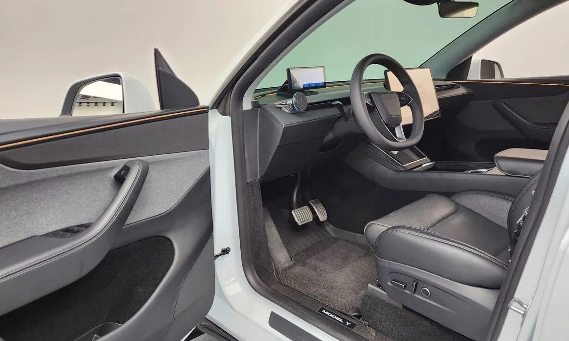 Tesla Model Y — фото 7