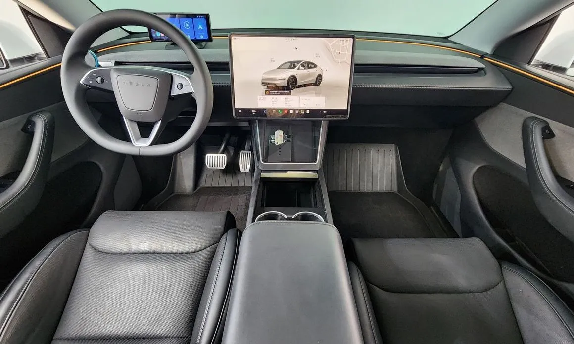 Tesla Model Y — фото 9