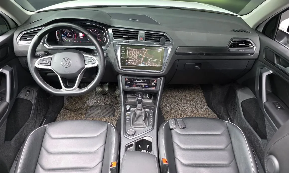 Volkswagen Tiguan — фото 7