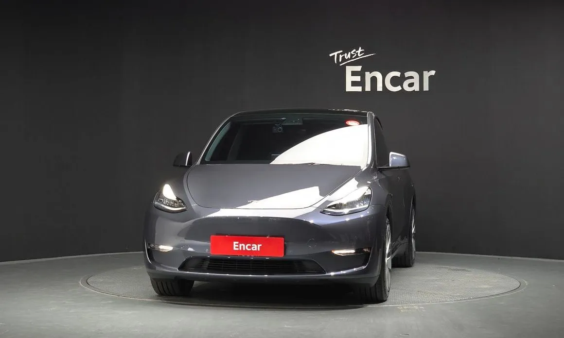 Tesla Model Y — фото 10