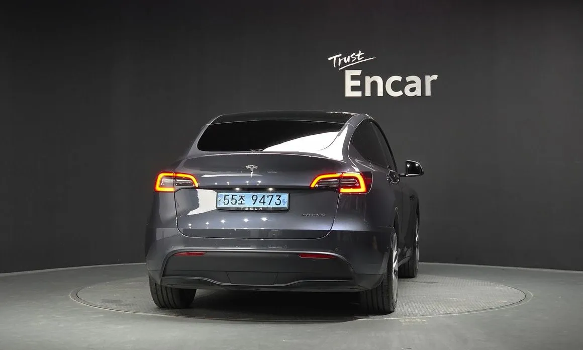 Tesla Model Y — фото 8
