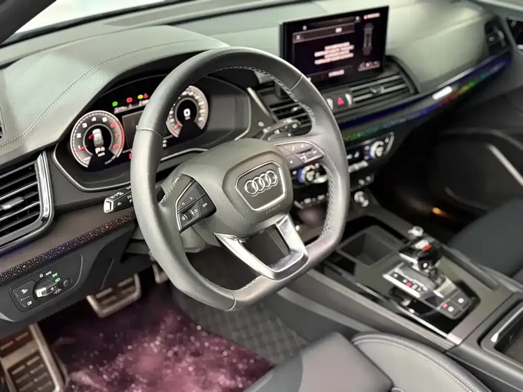 Audi Q5L — фото 10