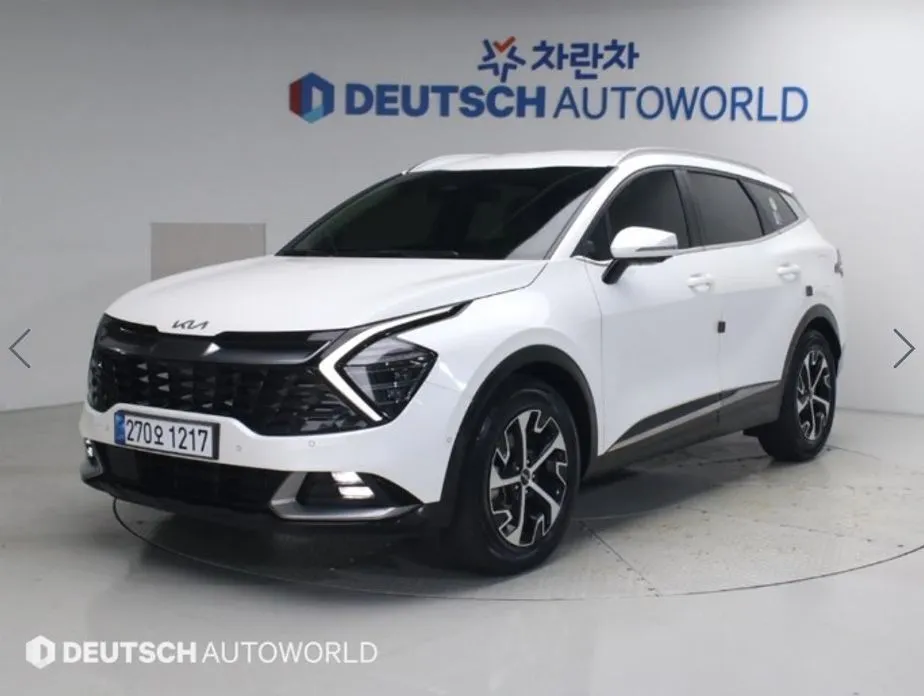 Kia Sportage — фото 1