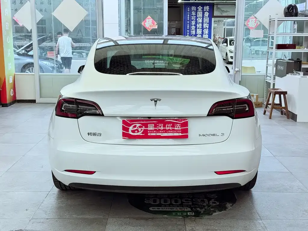 Tesla Model 3 — фото 5