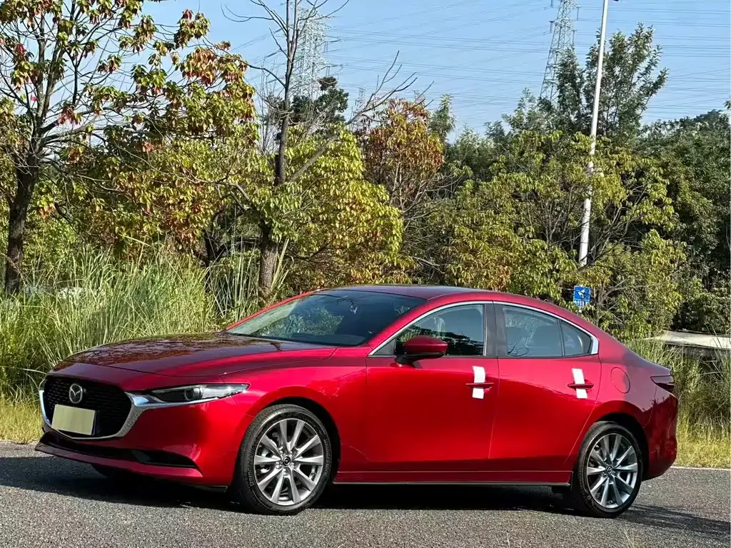 Mazda 3 Axela — фото 1