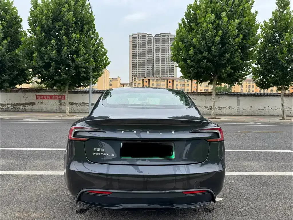 Tesla Model 3 — фото 7