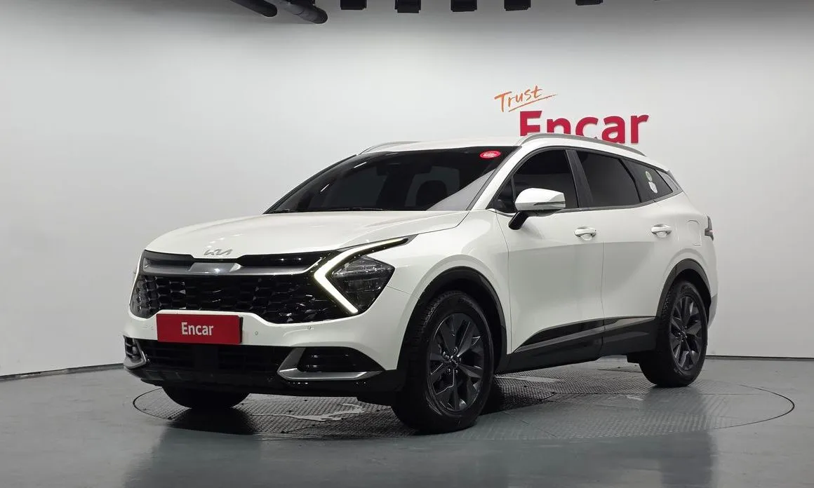 Kia Sportage — фото 1