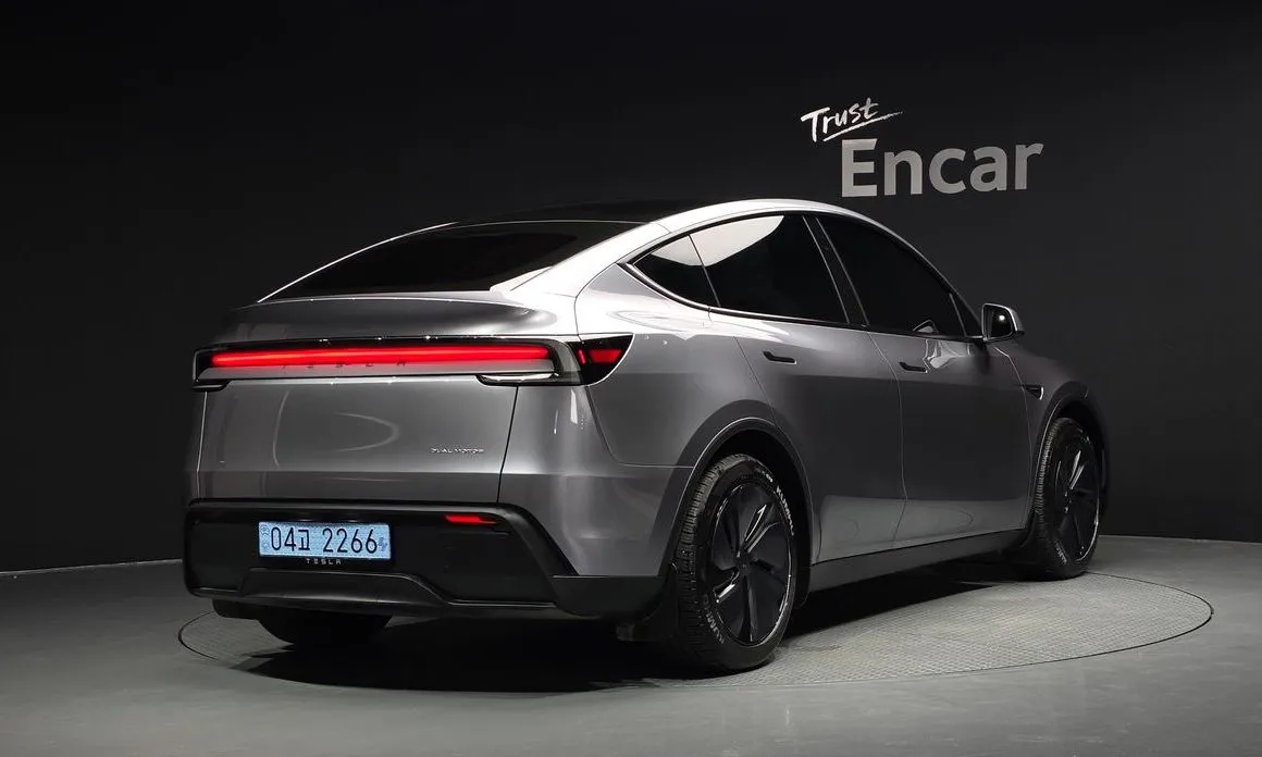 Tesla Model Y — фото 6