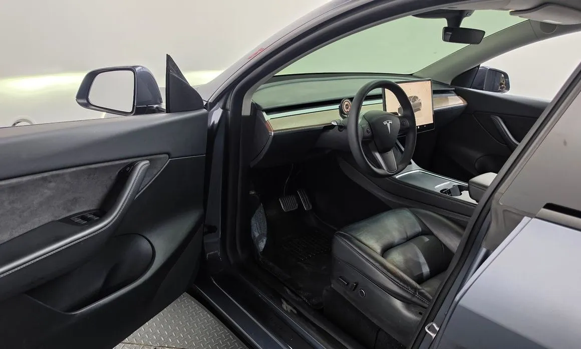 Tesla Model Y — фото 7