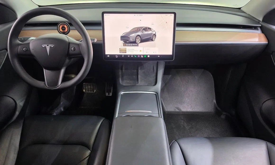 Tesla Model Y — фото 10