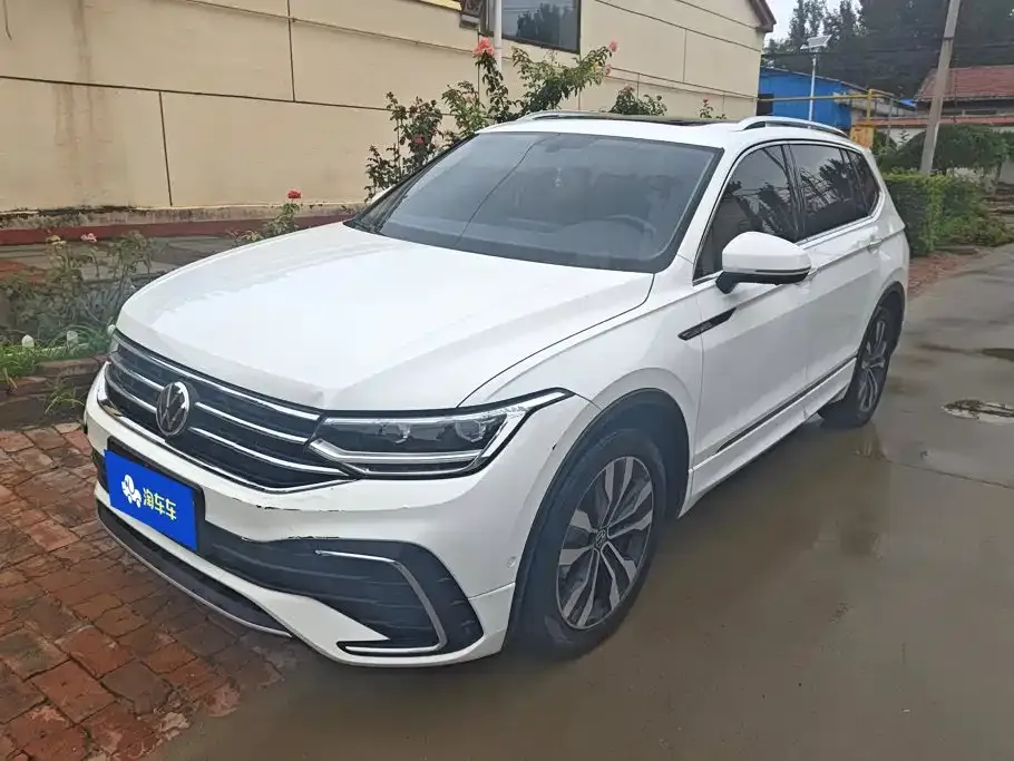 Volkswagen Tiguan L — фото 1