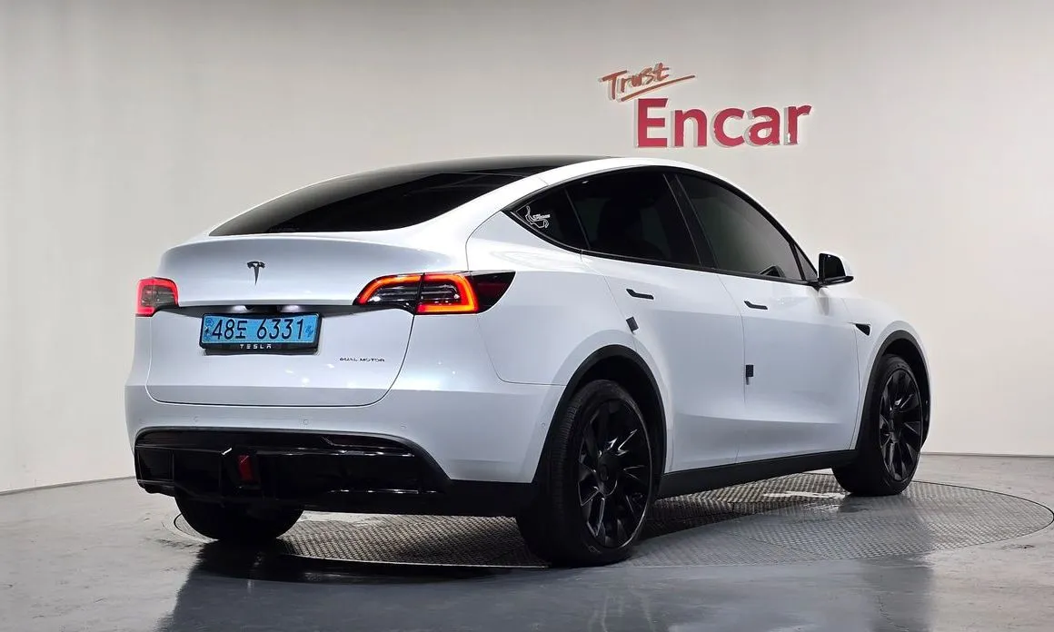 Tesla Model Y — фото 7