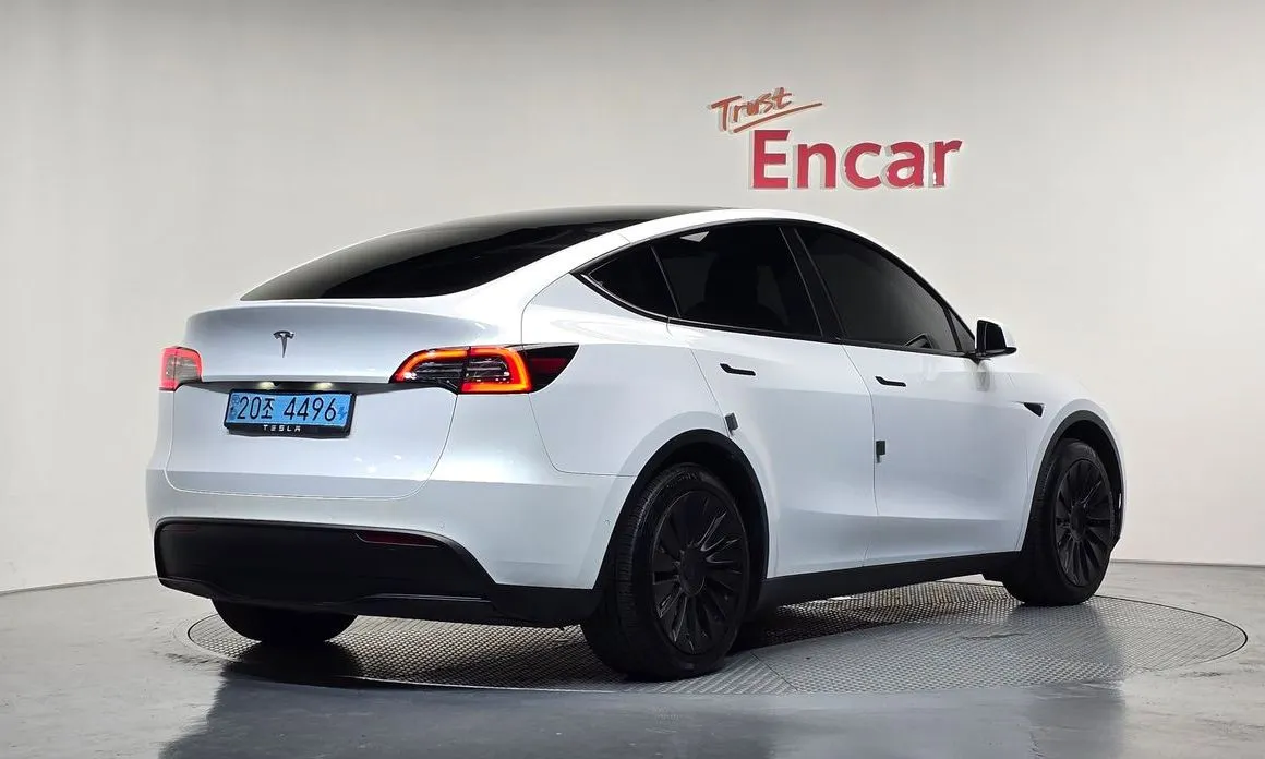 Tesla Model Y — фото 8