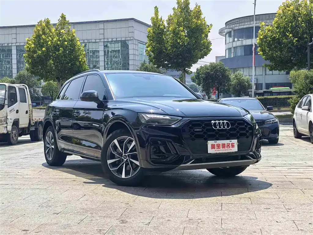 Audi Q5L — фото 10