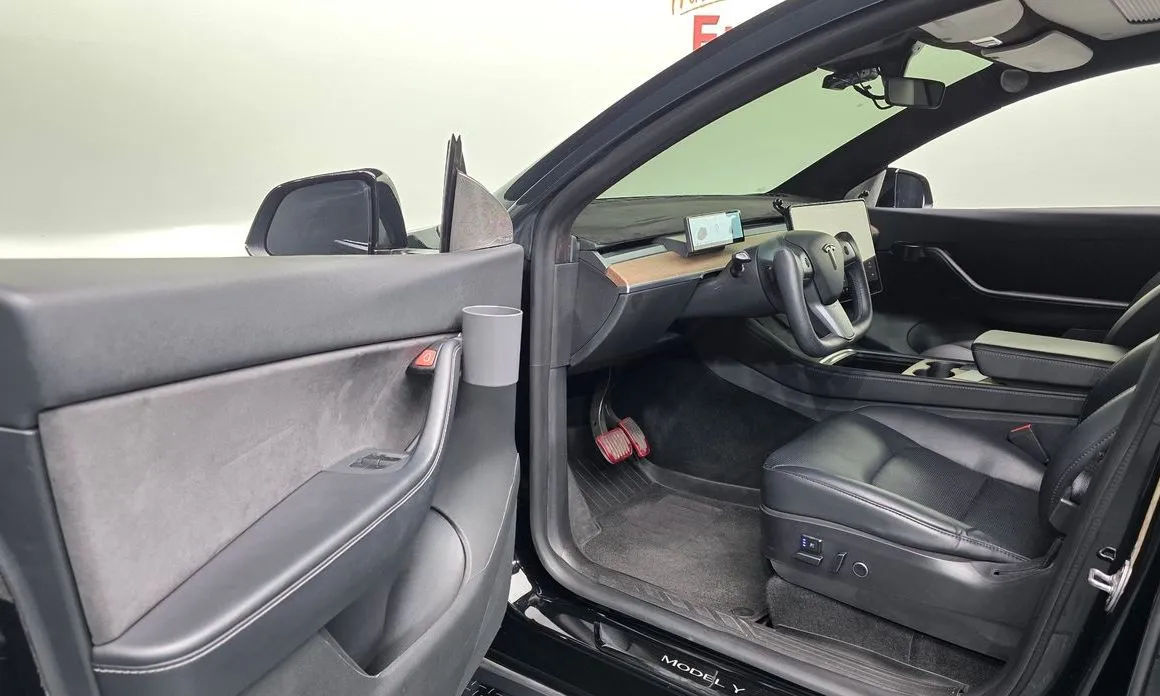 Tesla Model Y — фото 9