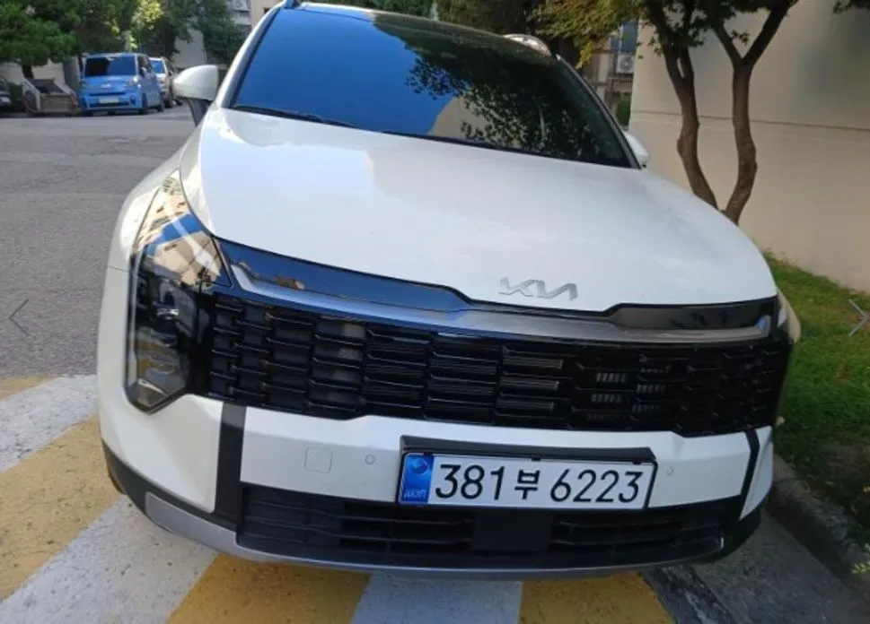 Kia Sportage — фото 1