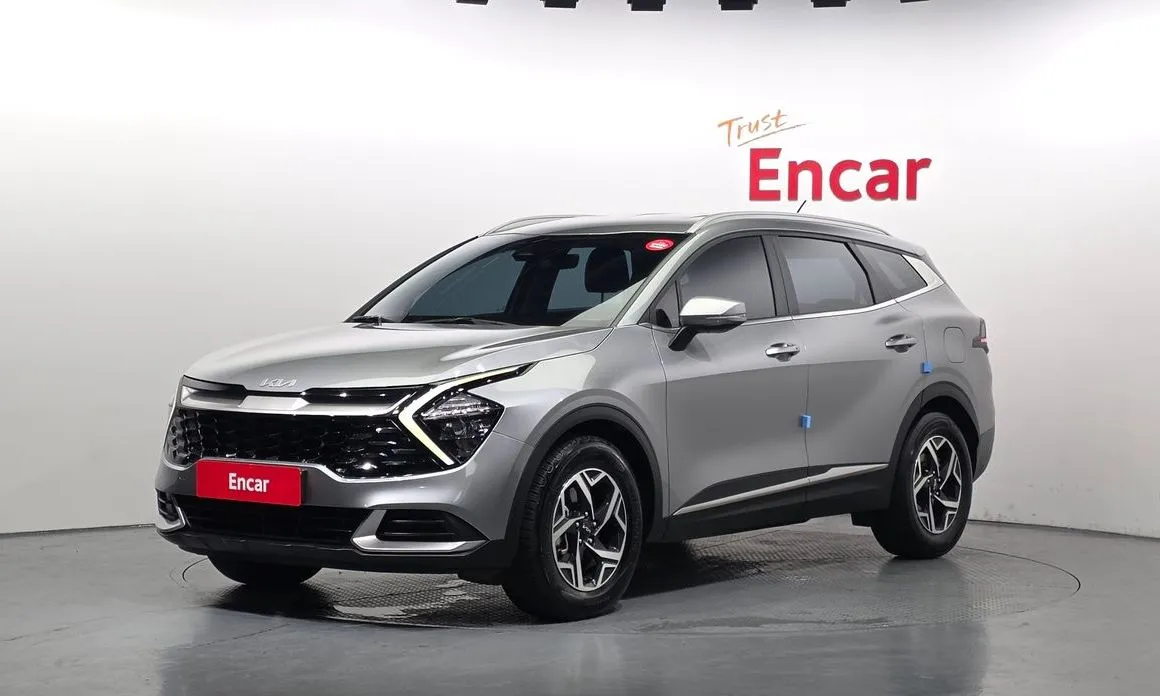 Kia Sportage — фото 1