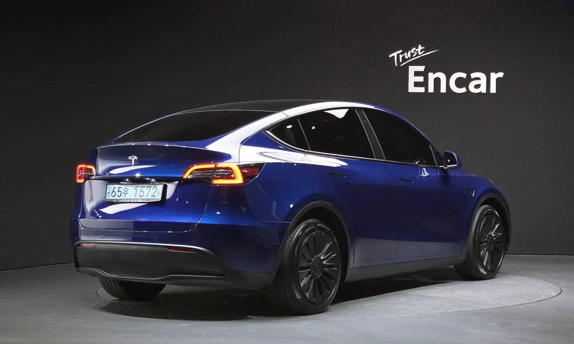 Tesla Model Y — фото 8
