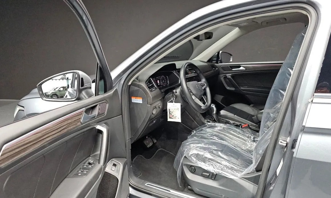 Volkswagen Tiguan — фото 8
