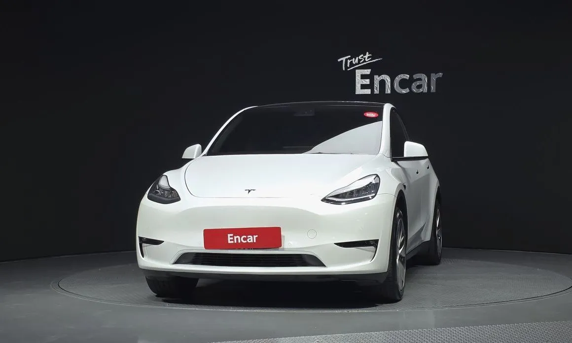 Tesla Model Y — фото 10