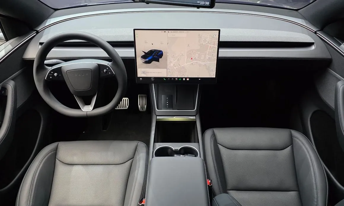 Tesla Model Y — фото 10