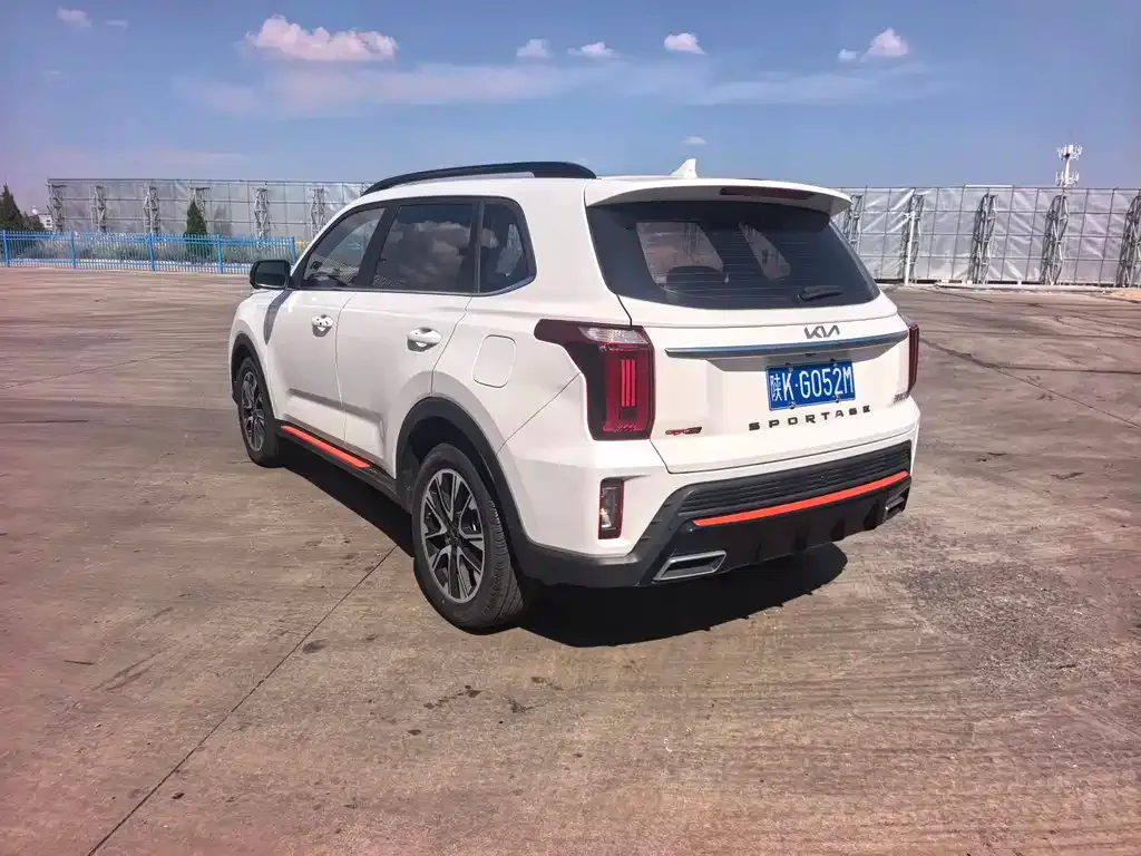 Kia Sportage — фото 10