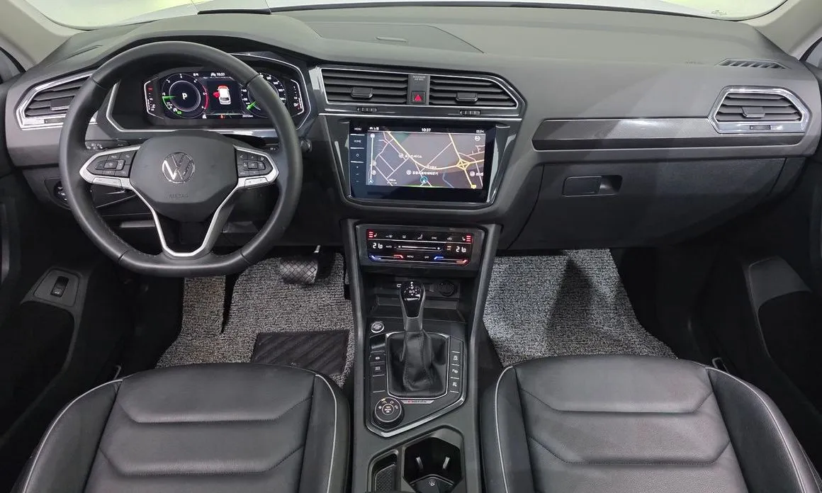 Volkswagen Tiguan — фото 9