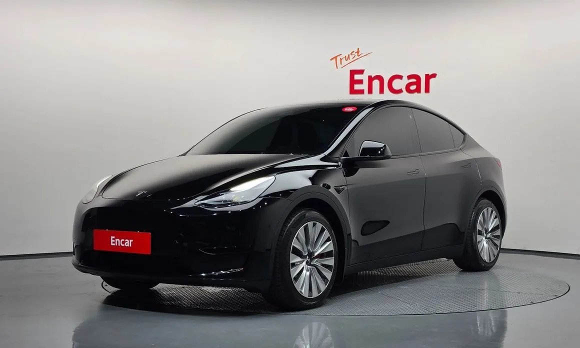 Tesla Model Y — фото 1