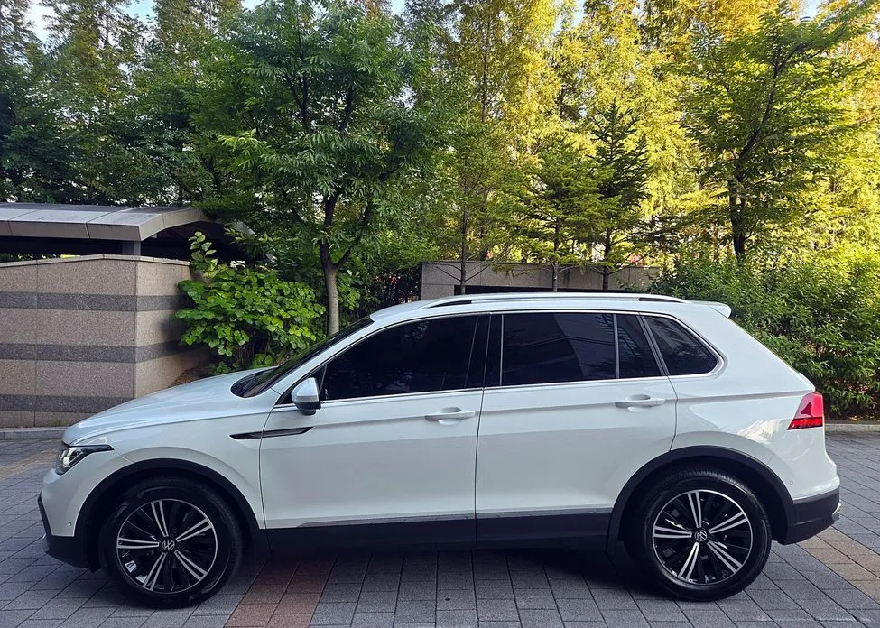 Volkswagen Tiguan — фото 8