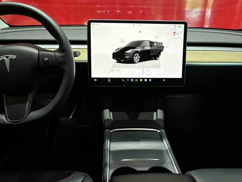 Tesla Model Y — фото 10