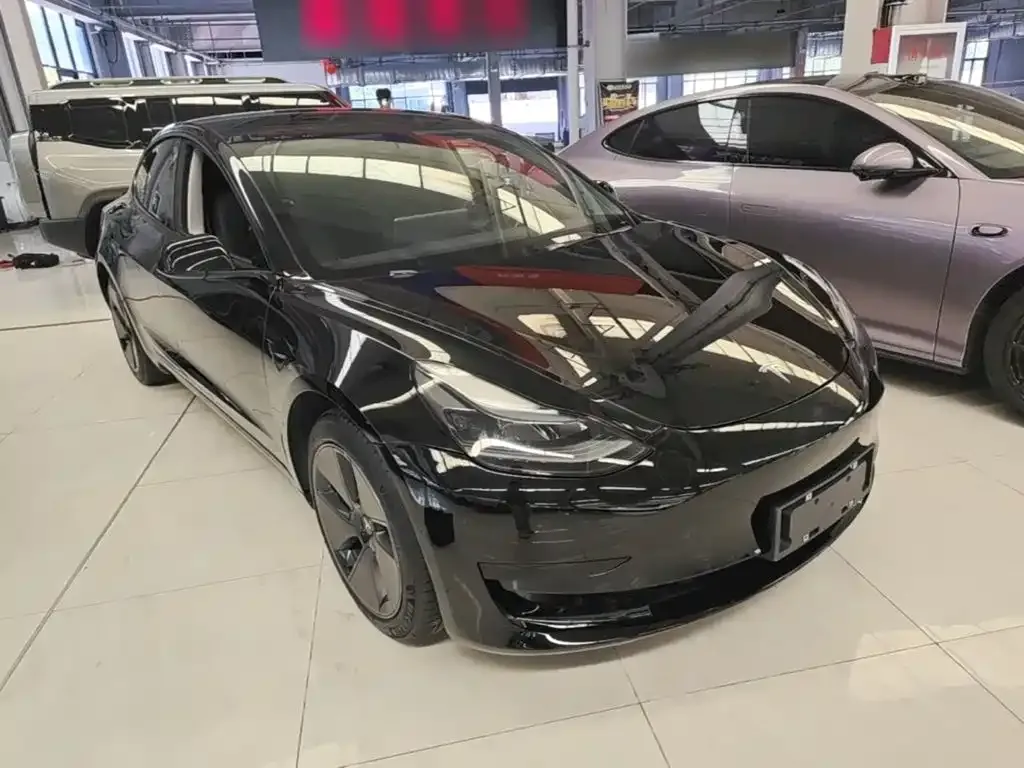 Tesla Model 3 — фото 8