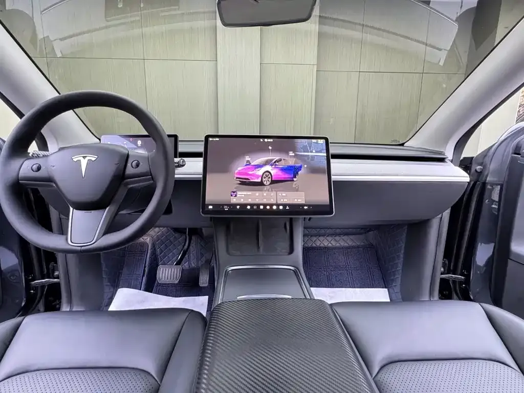 Tesla Model Y — фото 9