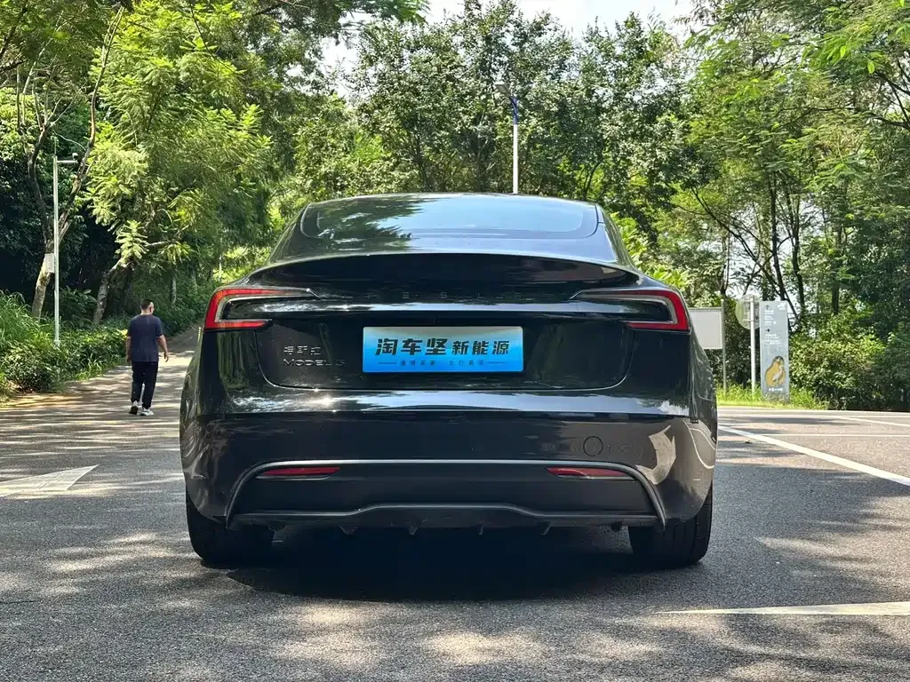 Tesla Model 3 — фото 7