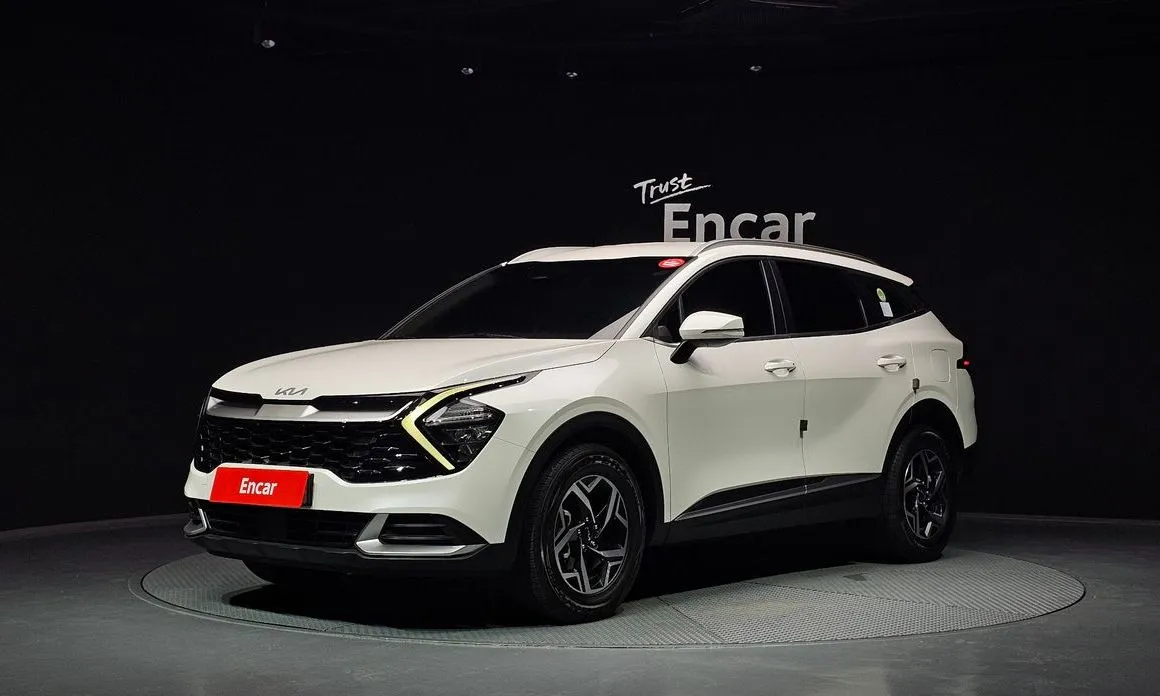 Kia Sportage — фото 1