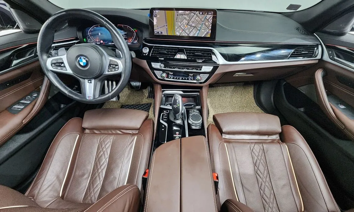 BMW 5-Series — фото 10