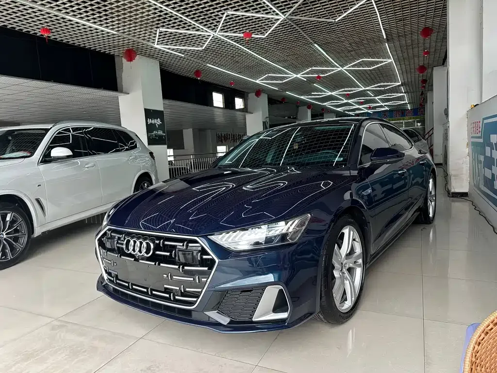 Audi A7L — фото 8