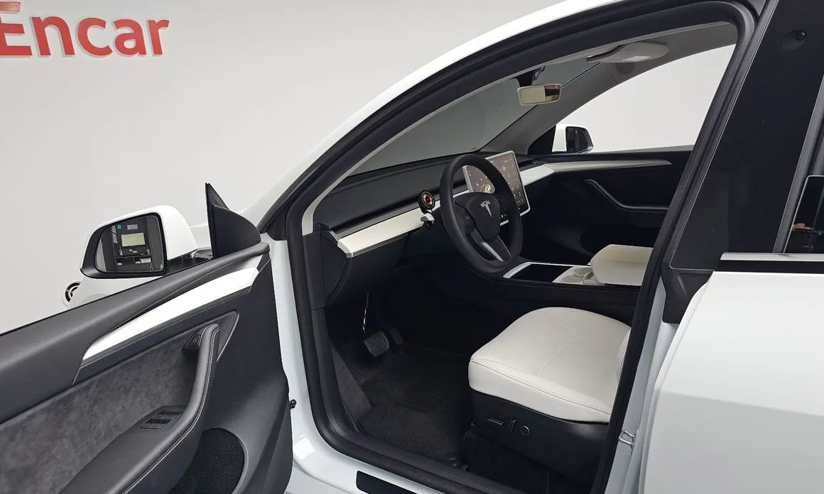 Tesla Model Y — фото 7