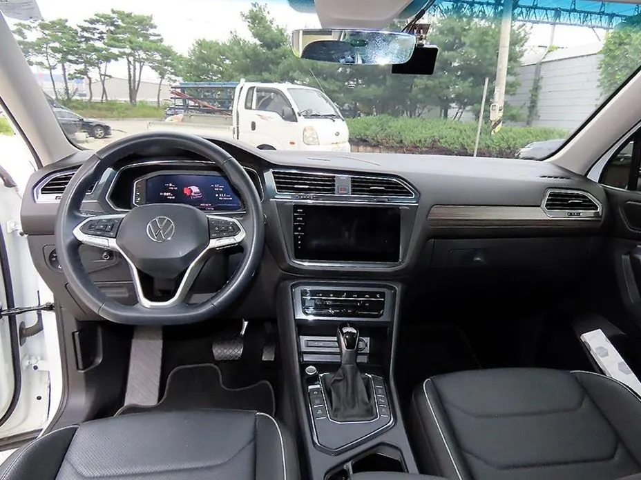 Volkswagen Tiguan — фото 10