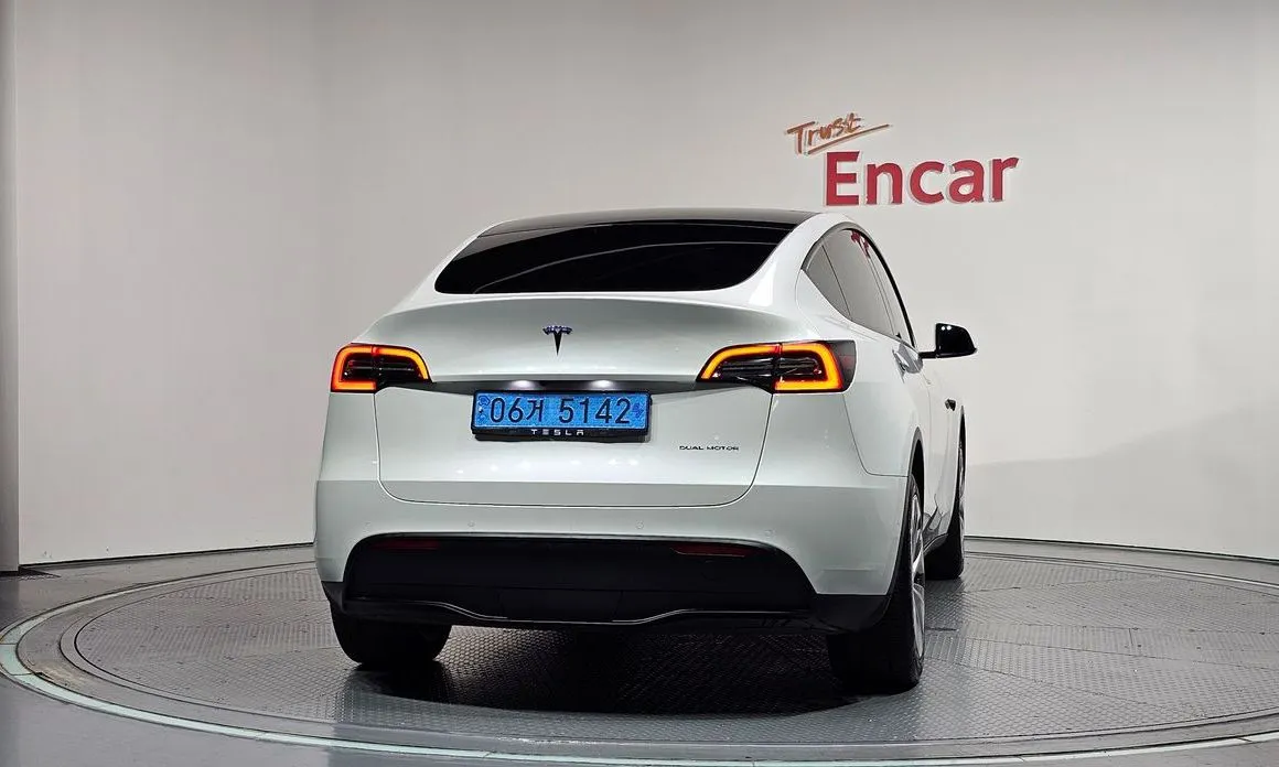 Tesla Model Y — фото 7
