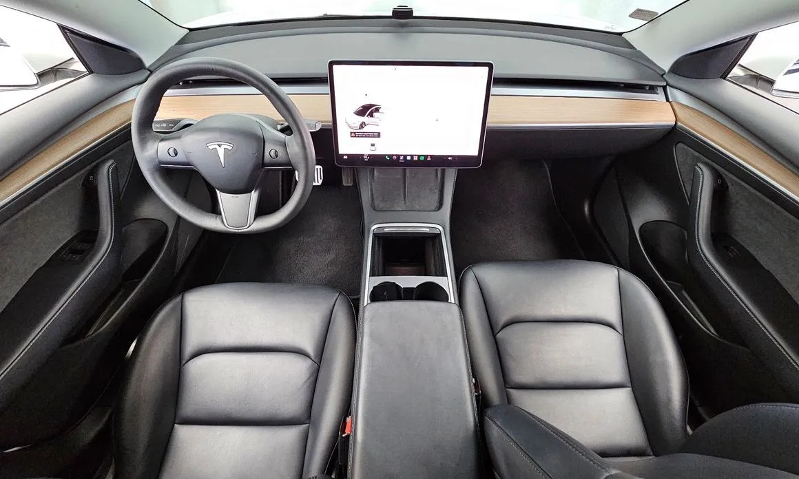 Tesla Model 3 — фото 7