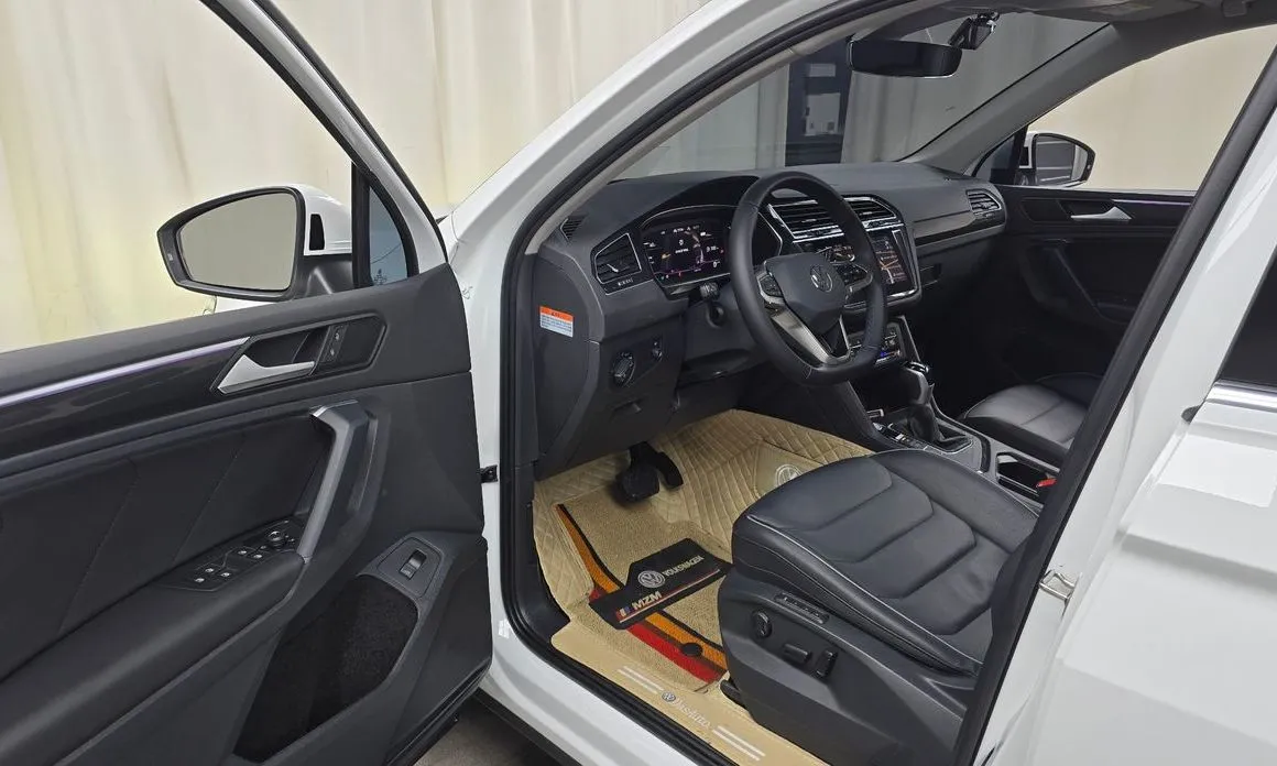Volkswagen Tiguan — фото 6