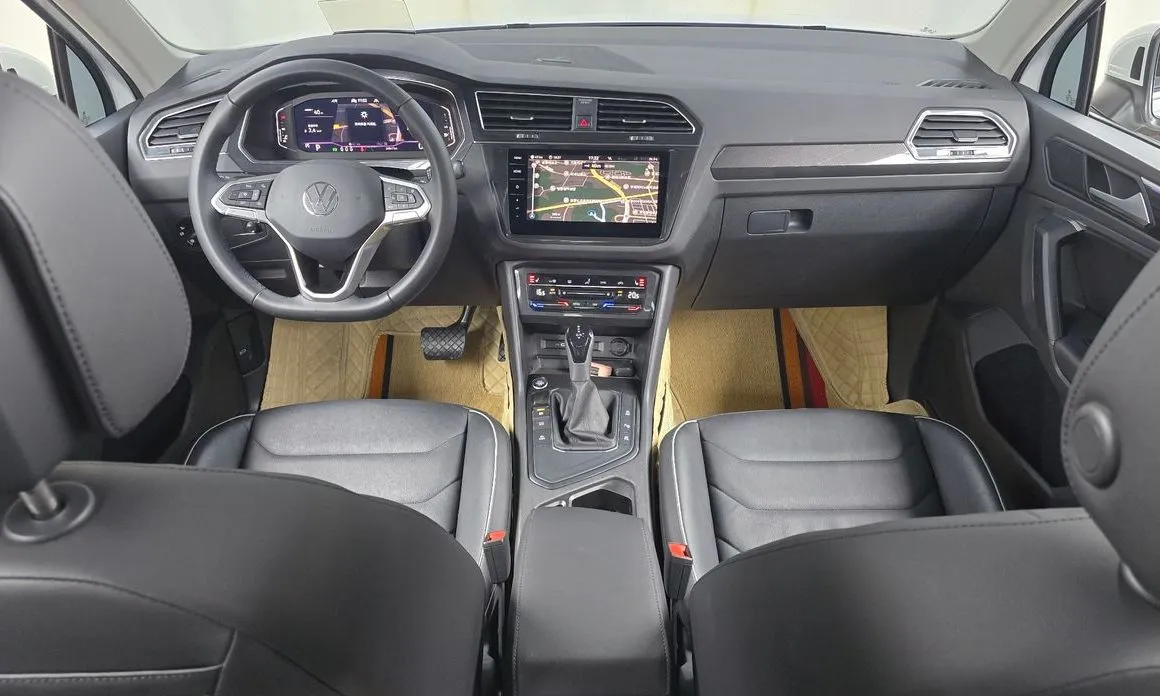 Volkswagen Tiguan — фото 10