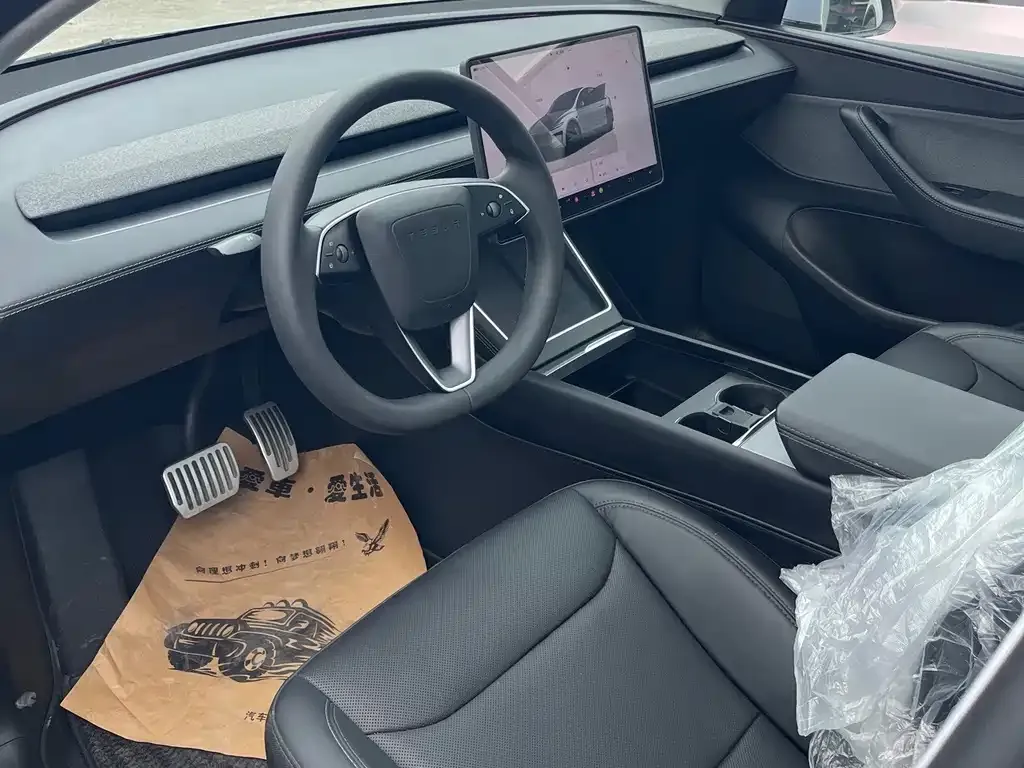 Tesla Model Y — фото 7