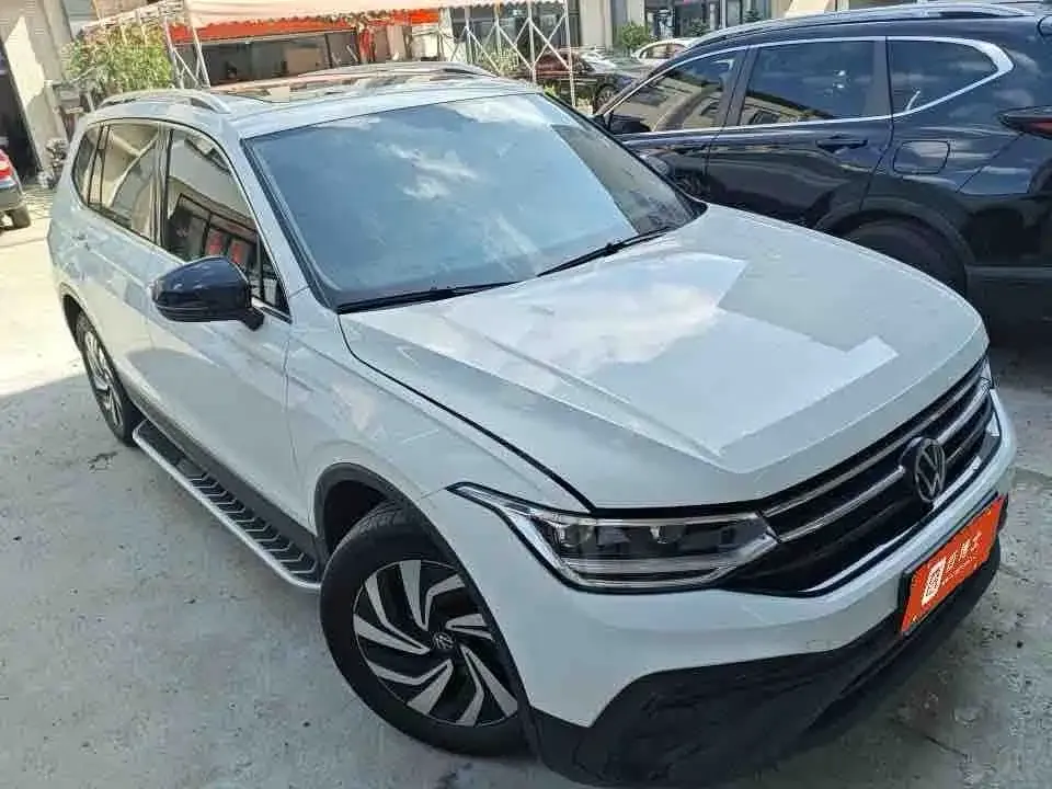 Volkswagen Tiguan L — фото 7