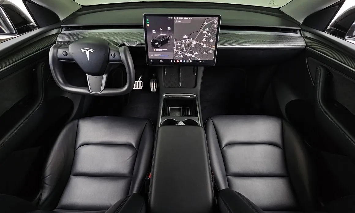 Tesla Model Y — фото 9
