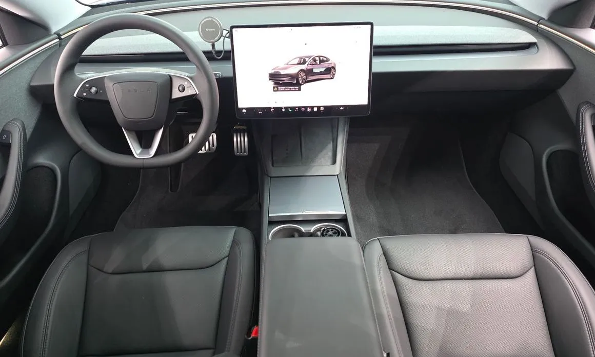 Tesla Model 3 — фото 10