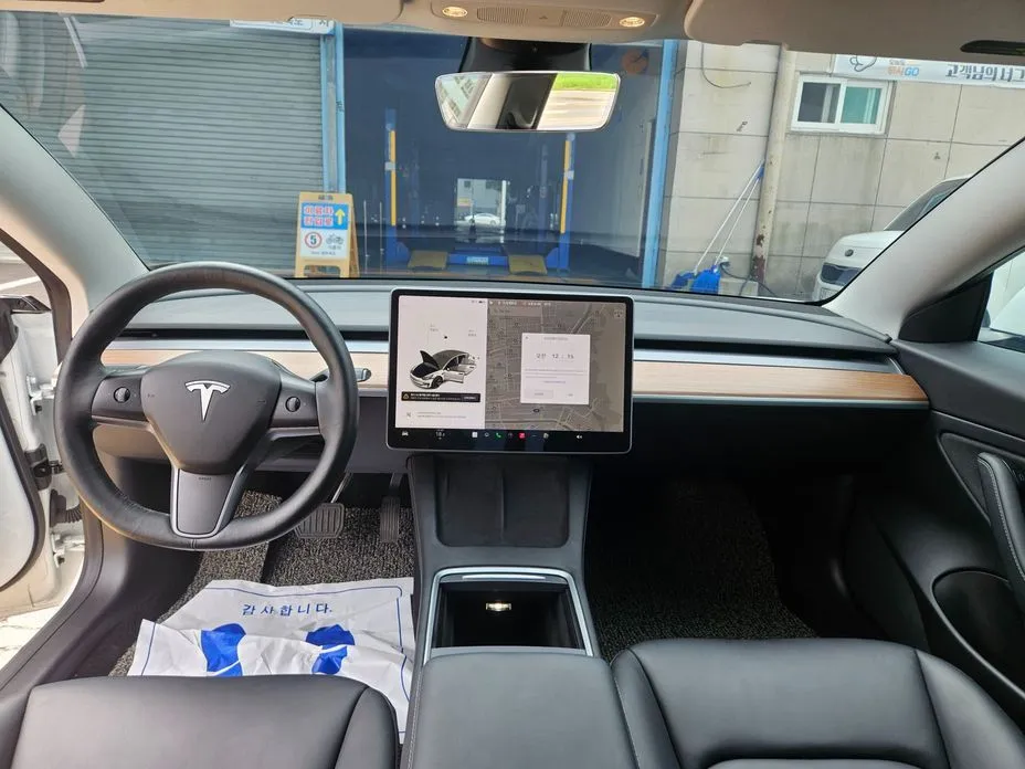 Tesla Model 3 — фото 2