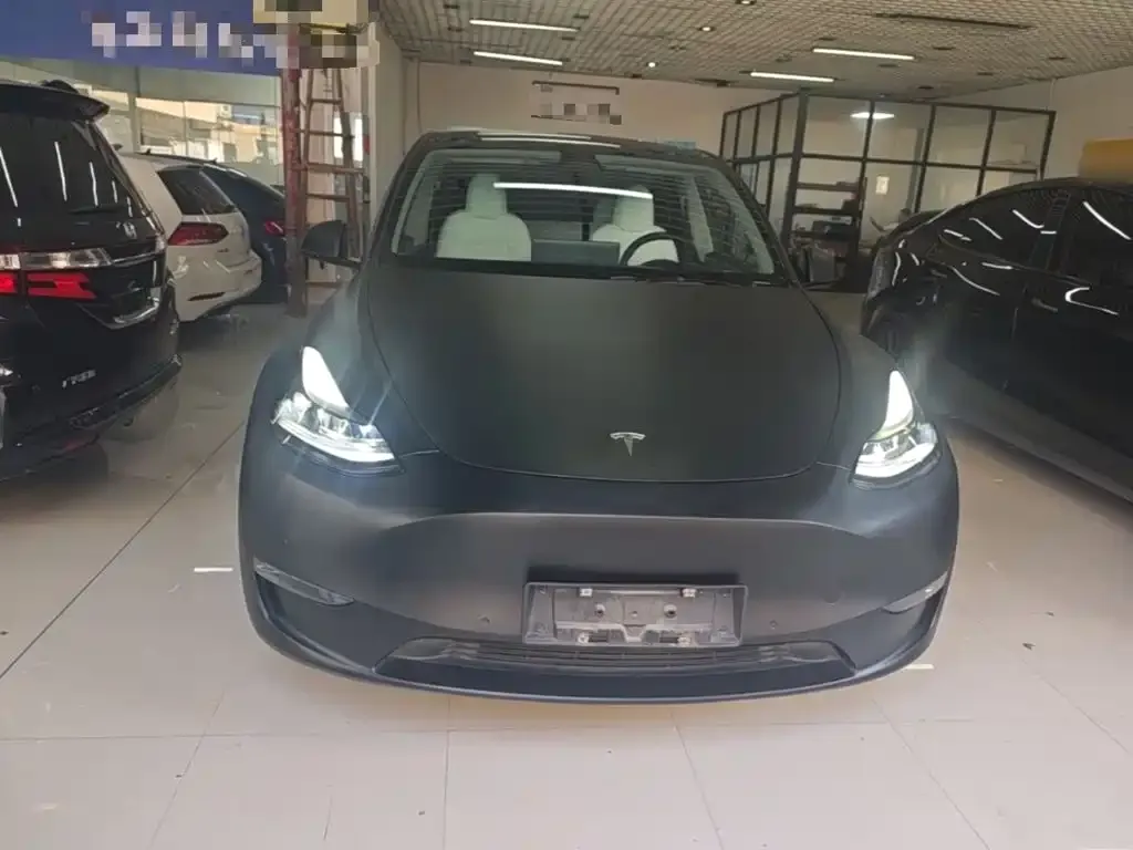Tesla Model Y — фото 8