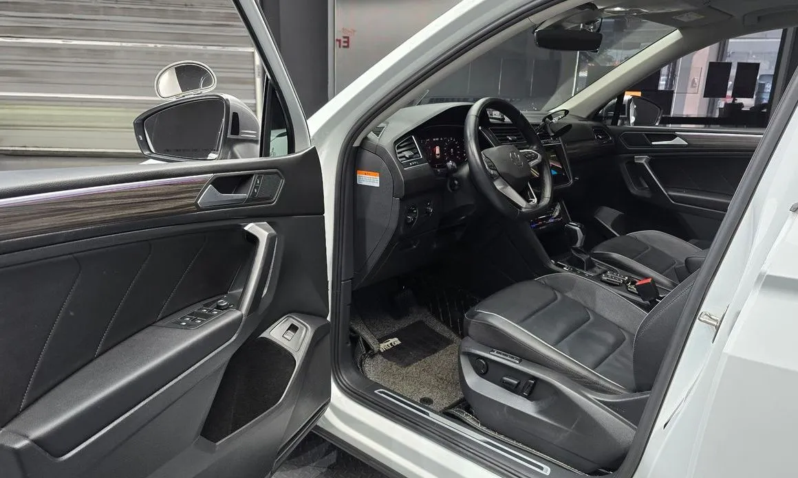 Volkswagen Tiguan — фото 10