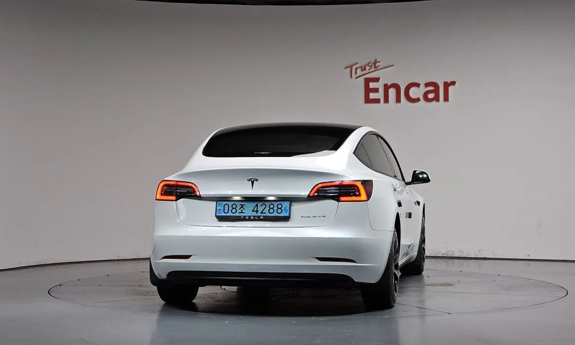 Tesla Model 3 — фото 10